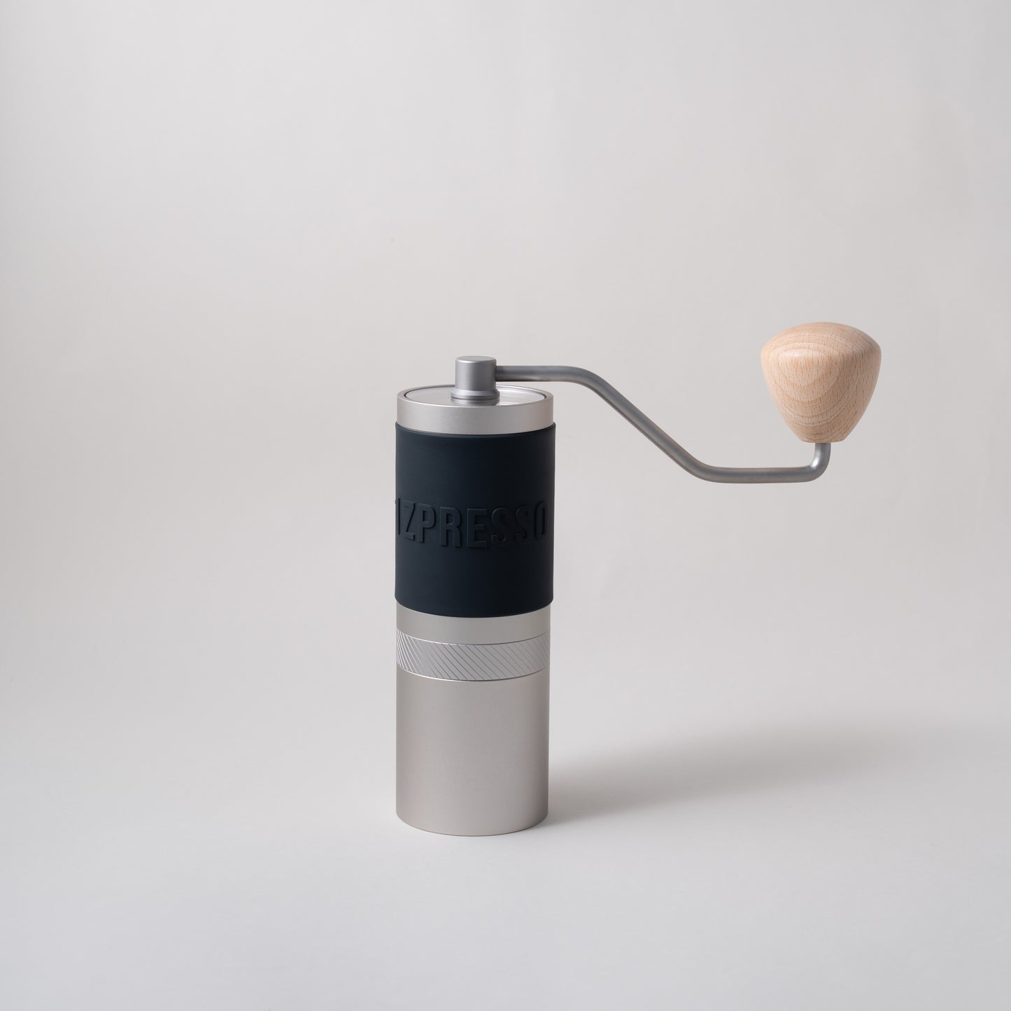 Hand grinders for filter coffee. Manual coffee grinder. Specialty coffee grinder. Black and silver with wooden handle.