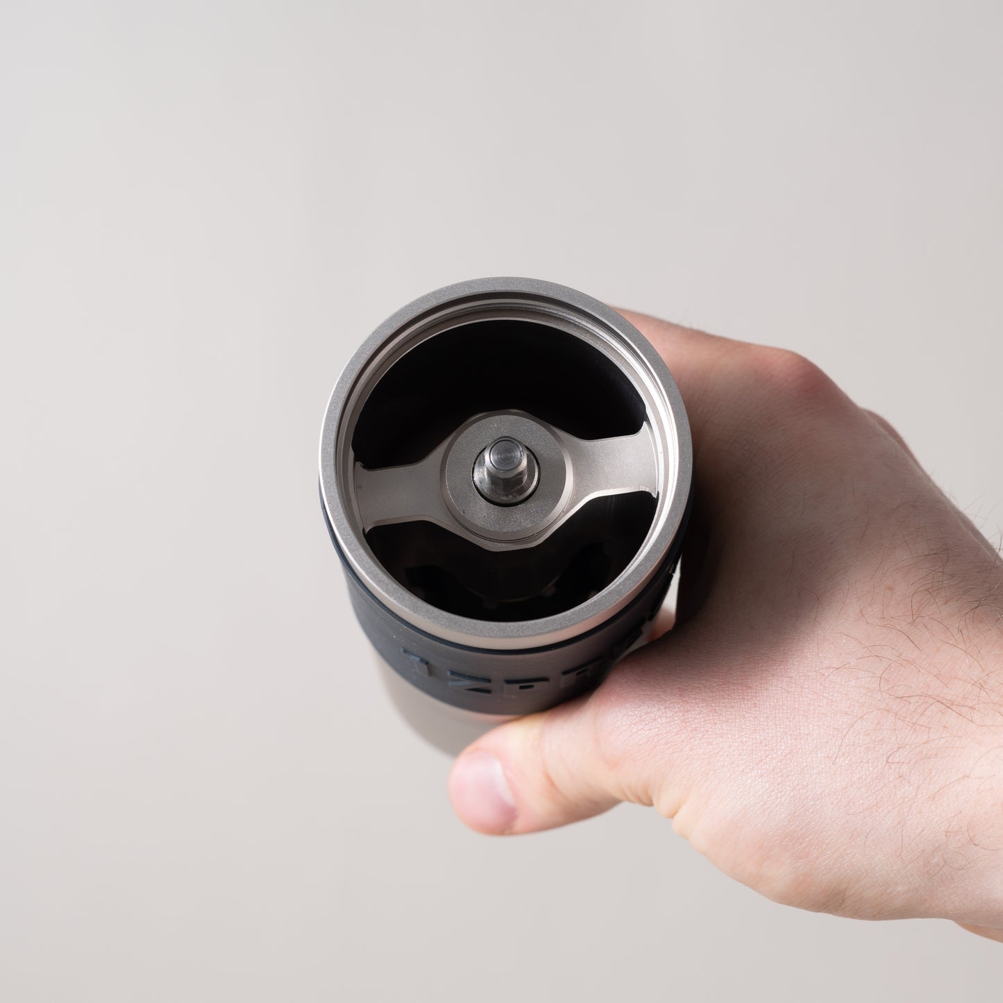 Hand grinders for filter coffee. Manual coffee grinder. Top view of chamber