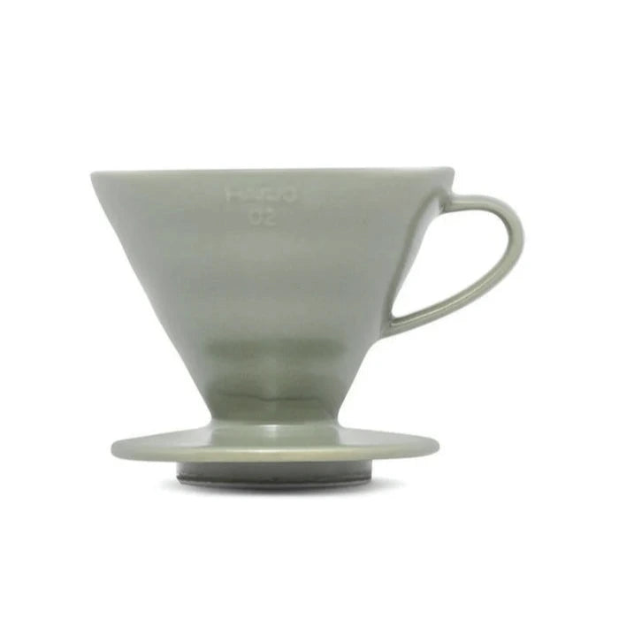 Oil Green ceramic coffee filter on a white background