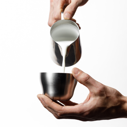 OREA STAC Cups with milk being poured in