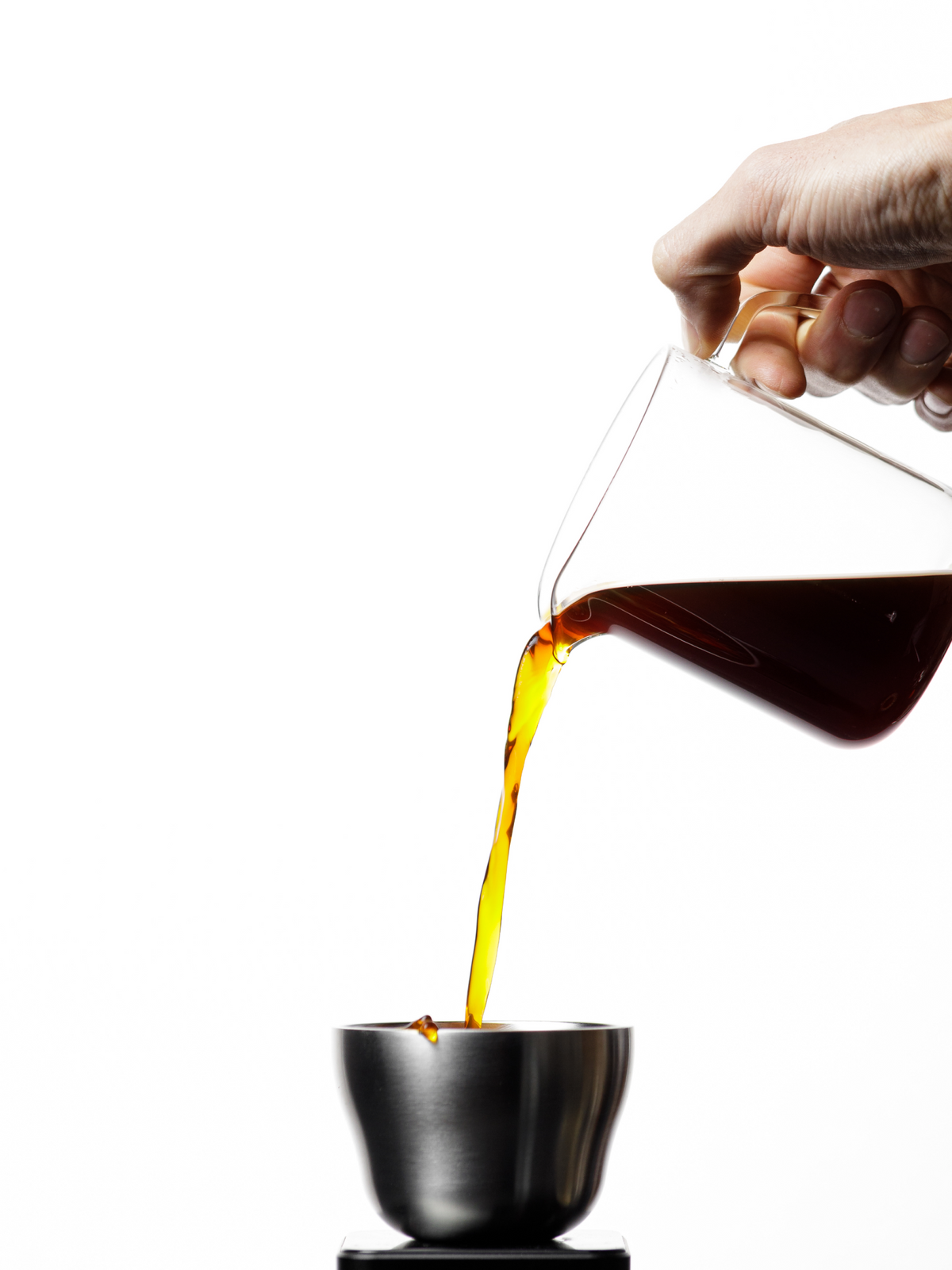 OREA Service Pitcher 300ml pouring coffee into an OREA STAC cup