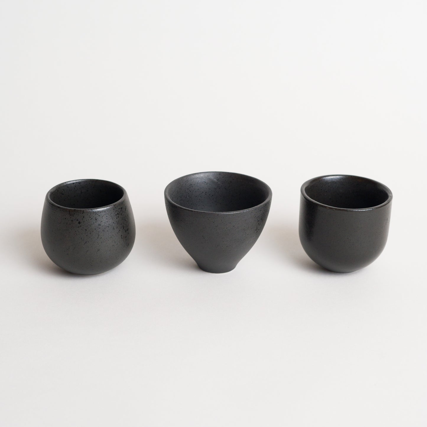 Hand made, pottery feel with texture. Specialty coffee, designer coffee cups. 3 shapes, Professional and home use. in Basalt