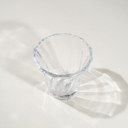 Glass is a great alternative material to our porcelain cups. It is a green, 100% recyclable, strong and non porous material. Glass in clear
